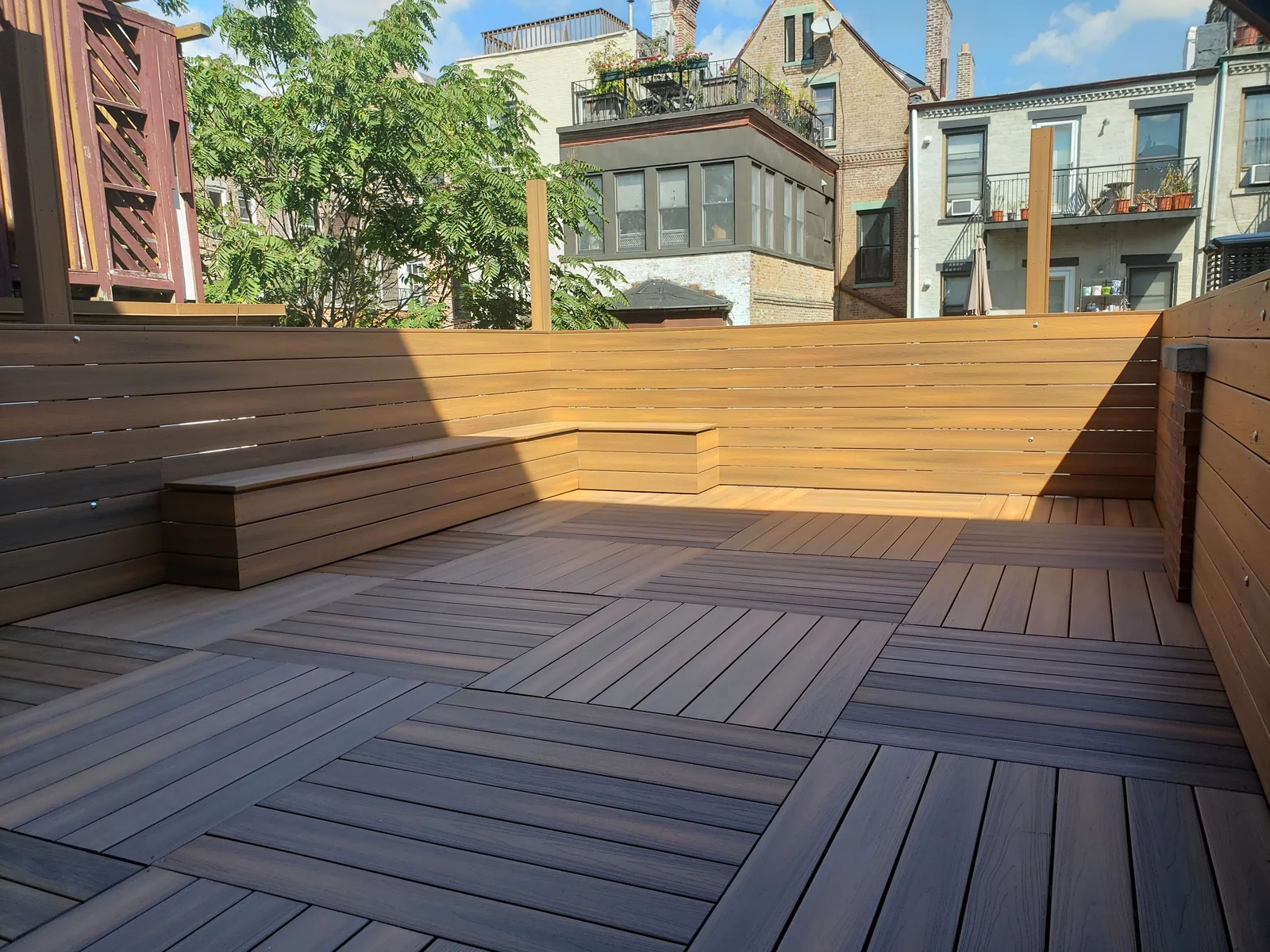 Modular deck built in bench by City Decks New York.