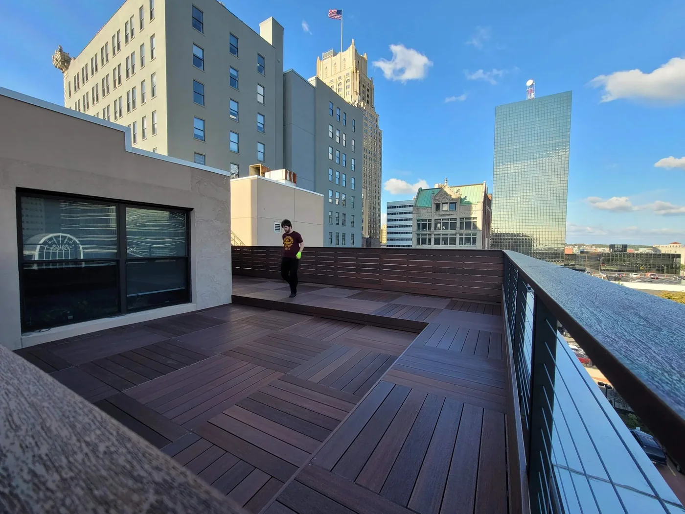 City Decks rooftop project with patterned decking, raised deck areas and horizontal privacy screening